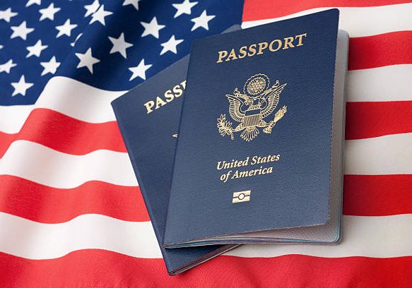 U.S. Passports on an American Stars and Stripes flag.