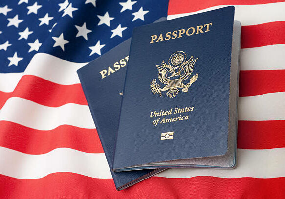 U.S. Passports on an American Stars and Stripes flag.